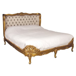 A golden hand carved bed. A positively palatial resting place...